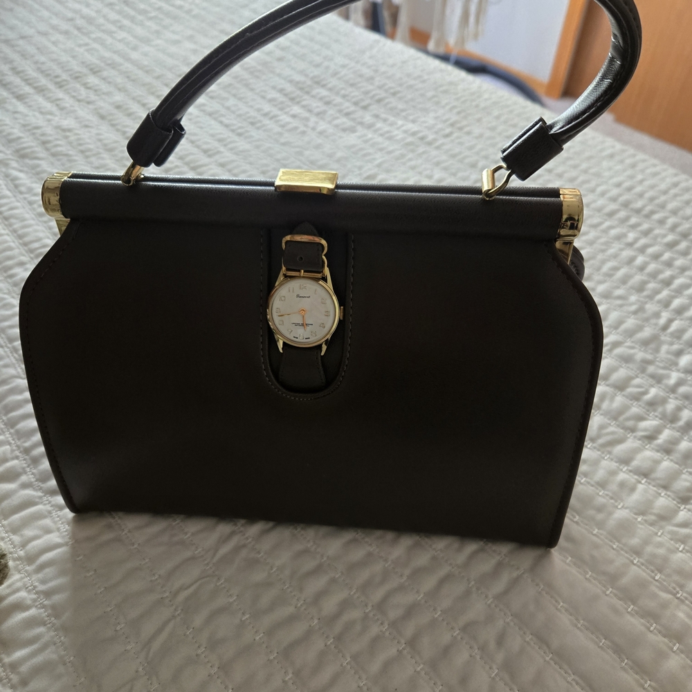 Elegant Brown Handbag with Gold Accents